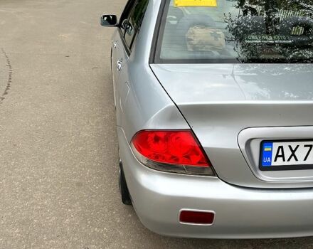 Серый Мицубиси Лансер, объемом двигателя 1.6 л и пробегом 0 тыс. км за 4000 $, фото 3 на Automoto.ua