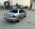 Сірий Міцубісі Lancer, об'ємом двигуна 2 л та пробігом 199 тис. км за 4400 $, фото 1 на Automoto.ua