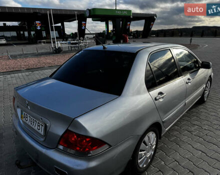 Сірий Міцубісі Lancer, об'ємом двигуна 1.58 л та пробігом 333 тис. км за 2700 $, фото 4 на Automoto.ua