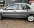 Сірий Міцубісі Lancer, об'ємом двигуна 1.6 л та пробігом 262 тис. км за 4400 $, фото 7 на Automoto.ua