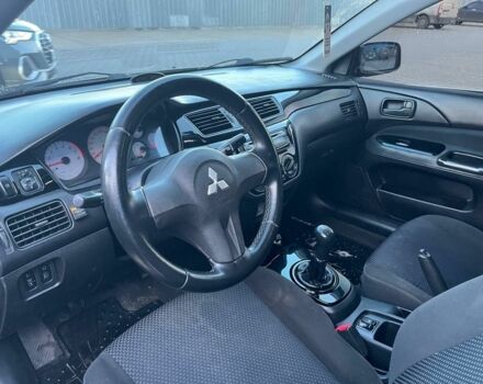 Серый Мицубиси Лансер, объемом двигателя 1.6 л и пробегом 279 тыс. км за 3990 $, фото 5 на Automoto.ua