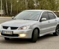 Серый Мицубиси Лансер, объемом двигателя 1.6 л и пробегом 230 тыс. км за 4450 $, фото 4 на Automoto.ua