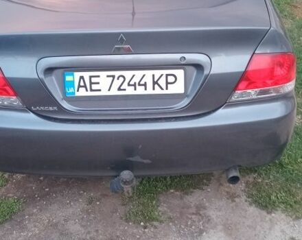Серый Мицубиси Лансер, объемом двигателя 1.6 л и пробегом 270 тыс. км за 3700 $, фото 2 на Automoto.ua