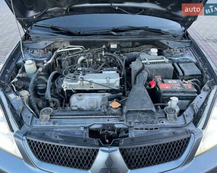 Серый Мицубиси Лансер, объемом двигателя 1.6 л и пробегом 279 тыс. км за 3990 $, фото 14 на Automoto.ua