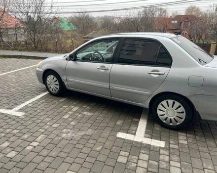 Серый Мицубиси Лансер, объемом двигателя 1.6 л и пробегом 333 тыс. км за 2800 $, фото 4 на Automoto.ua