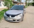 Сірий Міцубісі Lancer, об'ємом двигуна 1.59 л та пробігом 217 тис. км за 4600 $, фото 4 на Automoto.ua