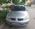 Сірий Міцубісі Lancer, об'ємом двигуна 1.6 л та пробігом 298 тис. км за 3300 $, фото 1 на Automoto.ua