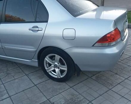 Мицубиси Лансер 2006 в Каменское - Днепродзержинск на Automoto.ua Серый Мицубиси Лансер, объемом двигателя 1.58 л и пробегом 238 тыс. км за 5400 $, фото 2 на Automoto.ua