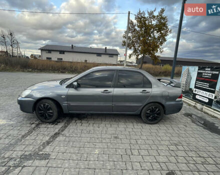 Серый Мицубиси Лансер, объемом двигателя 1.6 л и пробегом 213 тыс. км за 4500 $, фото 3 на Automoto.ua