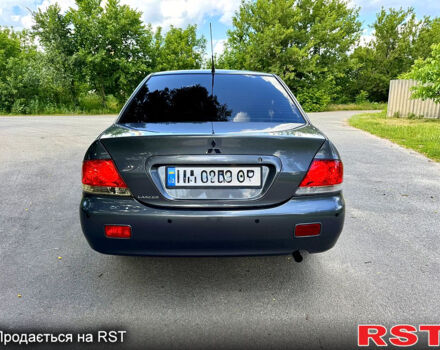 Серый Мицубиси Лансер, объемом двигателя 1.6 л и пробегом 188 тыс. км за 5490 $, фото 4 на Automoto.ua