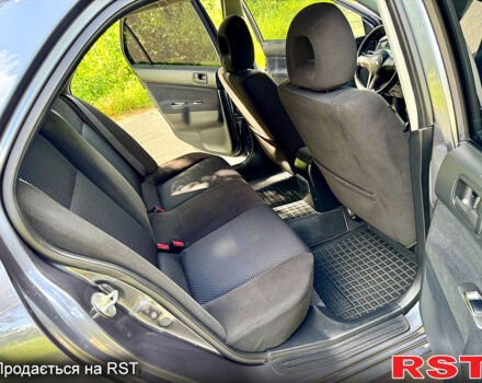 Серый Мицубиси Лансер, объемом двигателя 1.6 л и пробегом 188 тыс. км за 5490 $, фото 9 на Automoto.ua