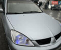 Сірий Міцубісі Lancer, об'ємом двигуна 2 л та пробігом 187 тис. км за 4500 $, фото 15 на Automoto.ua