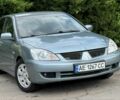 Серый Мицубиси Лансер, объемом двигателя 1.6 л и пробегом 220 тыс. км за 4400 $, фото 7 на Automoto.ua