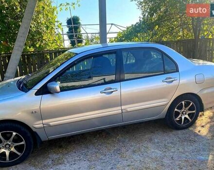 Сірий Міцубісі Lancer, об'ємом двигуна 1.6 л та пробігом 36 тис. км за 3500 $, фото 2 на Automoto.ua