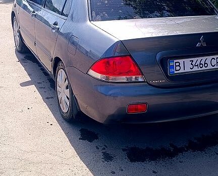 Сірий Міцубісі Lancer, об'ємом двигуна 1.6 л та пробігом 228 тис. км за 3500 $, фото 3 на Automoto.ua