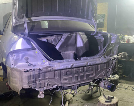 Серый Мицубиси Лансер, объемом двигателя 2 л и пробегом 256 тыс. км за 7000 $, фото 14 на Automoto.ua