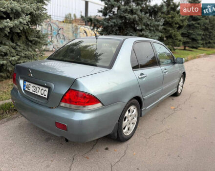 Серый Мицубиси Лансер, объемом двигателя 1.58 л и пробегом 260 тыс. км за 4050 $, фото 6 на Automoto.ua