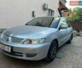 Сірий Міцубісі Lancer, об'ємом двигуна 1.58 л та пробігом 237 тис. км за 3700 $, фото 1 на Automoto.ua