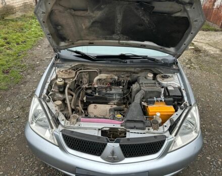 Сірий Міцубісі Lancer, об'ємом двигуна 1.6 л та пробігом 270 тис. км за 2900 $, фото 18 на Automoto.ua