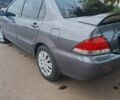 Сірий Міцубісі Lancer, об'ємом двигуна 1.6 л та пробігом 229 тис. км за 4900 $, фото 6 на Automoto.ua