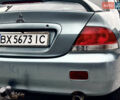 Сірий Міцубісі Lancer, об'ємом двигуна 1.58 л та пробігом 354 тис. км за 2999 $, фото 13 на Automoto.ua