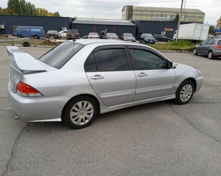 Сірий Міцубісі Lancer, об'ємом двигуна 1.6 л та пробігом 300 тис. км за 2999 $, фото 4 на Automoto.ua