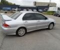 Сірий Міцубісі Lancer, об'ємом двигуна 1.6 л та пробігом 300 тис. км за 2999 $, фото 4 на Automoto.ua