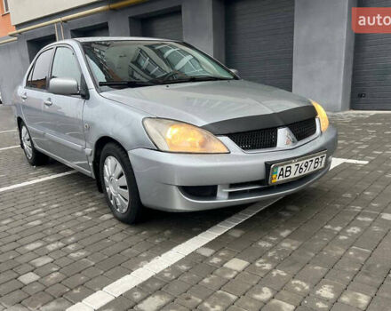 Сірий Міцубісі Lancer, об'ємом двигуна 1.58 л та пробігом 333 тис. км за 2999 $, фото 1 на Automoto.ua