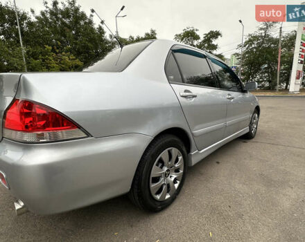 Серый Мицубиси Лансер, объемом двигателя 1.58 л и пробегом 183 тыс. км за 4800 $, фото 13 на Automoto.ua