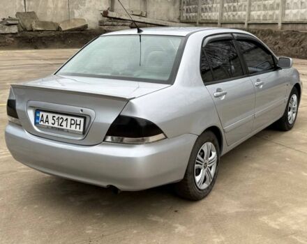 Сірий Міцубісі Lancer, об'ємом двигуна 1.6 л та пробігом 220 тис. км за 2450 $, фото 5 на Automoto.ua