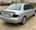 Сірий Міцубісі Lancer, об'ємом двигуна 1.6 л та пробігом 220 тис. км за 2450 $, фото 5 на Automoto.ua