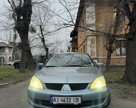 Сірий Міцубісі Lancer, об'ємом двигуна 1.6 л та пробігом 240 тис. км за 3000 $, фото 1 на Automoto.ua