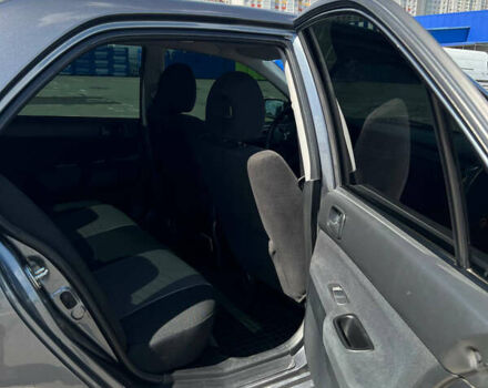 Сірий Міцубісі Lancer, об'ємом двигуна 1.6 л та пробігом 223 тис. км за 4500 $, фото 12 на Automoto.ua