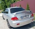 Сірий Міцубісі Lancer, об'ємом двигуна 1.58 л та пробігом 318 тис. км за 4700 $, фото 1 на Automoto.ua