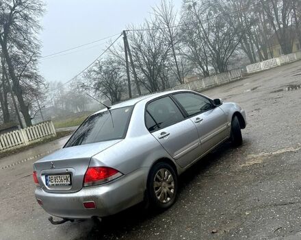 Серый Мицубиси Лансер, объемом двигателя 1.6 л и пробегом 123 тыс. км за 4000 $, фото 5 на Automoto.ua