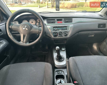 Сірий Міцубісі Lancer, об'ємом двигуна 1.58 л та пробігом 332 тис. км за 4650 $, фото 8 на Automoto.ua