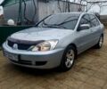 Сірий Міцубісі Lancer, об'ємом двигуна 1.6 л та пробігом 209 тис. км за 5200 $, фото 1 на Automoto.ua