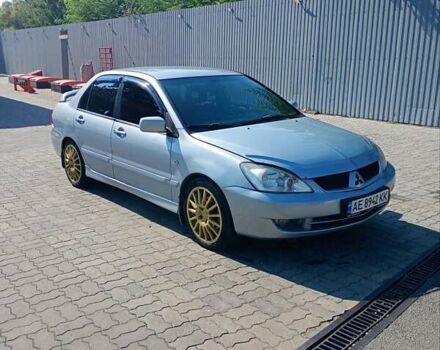Сірий Міцубісі Lancer, об'ємом двигуна 1.58 л та пробігом 265 тис. км за 2900 $, фото 1 на Automoto.ua