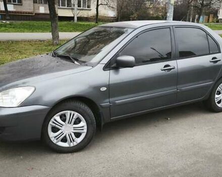 Серый Мицубиси Лансер, объемом двигателя 1.6 л и пробегом 263 тыс. км за 3650 $, фото 4 на Automoto.ua