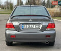 Сірий Міцубісі Lancer, об'ємом двигуна 1.58 л та пробігом 332 тис. км за 4650 $, фото 4 на Automoto.ua