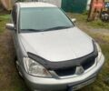 Сірий Міцубісі Lancer, об'ємом двигуна 1.58 л та пробігом 238 тис. км за 5000 $, фото 1 на Automoto.ua