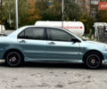 Сірий Міцубісі Lancer, об'ємом двигуна 1.58 л та пробігом 354 тис. км за 2999 $, фото 10 на Automoto.ua