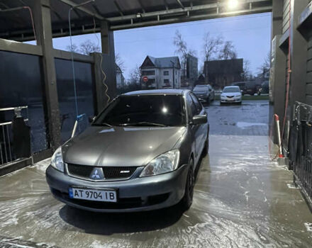 Серый Мицубиси Лансер, объемом двигателя 1.6 л и пробегом 213 тыс. км за 4500 $, фото 1 на Automoto.ua