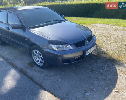 Серый Мицубиси Лансер, объемом двигателя 1.6 л и пробегом 291 тыс. км за 3900 $, фото 4 на Automoto.ua