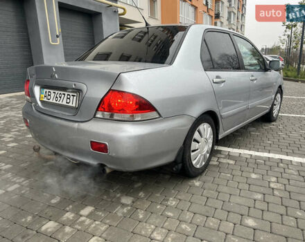Серый Мицубиси Лансер, объемом двигателя 1.58 л и пробегом 333 тыс. км за 2600 $, фото 5 на Automoto.ua