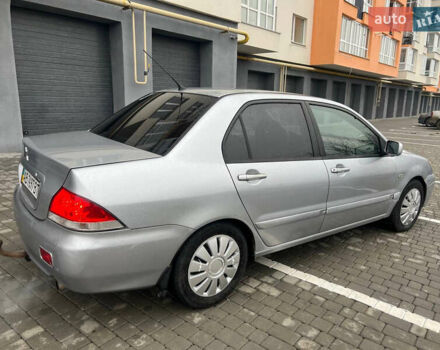 Сірий Міцубісі Lancer, об'ємом двигуна 1.58 л та пробігом 333 тис. км за 2999 $, фото 5 на Automoto.ua