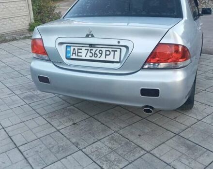 Мицубиси Лансер 2006 в Каменское - Днепродзержинск на Automoto.ua Серый Мицубиси Лансер, объемом двигателя 1.58 л и пробегом 238 тыс. км за 5400 $, фото 7 на Automoto.ua