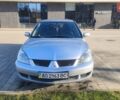Сірий Міцубісі Lancer, об'ємом двигуна 1.6 л та пробігом 206 тис. км за 3800 $, фото 1 на Automoto.ua