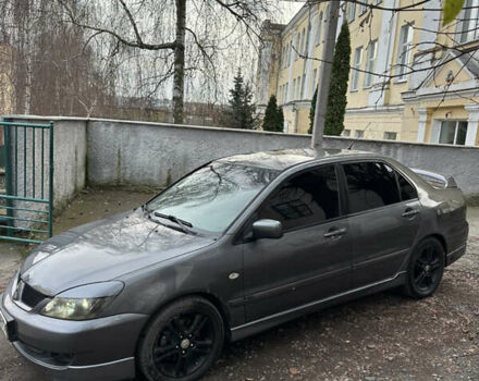 Сірий Міцубісі Lancer, об'ємом двигуна 2 л та пробігом 200 тис. км за 4999 $, фото 5 на Automoto.ua