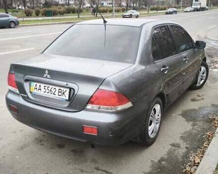 Серый Мицубиси Лансер, объемом двигателя 1.6 л и пробегом 263 тыс. км за 3650 $, фото 10 на Automoto.ua